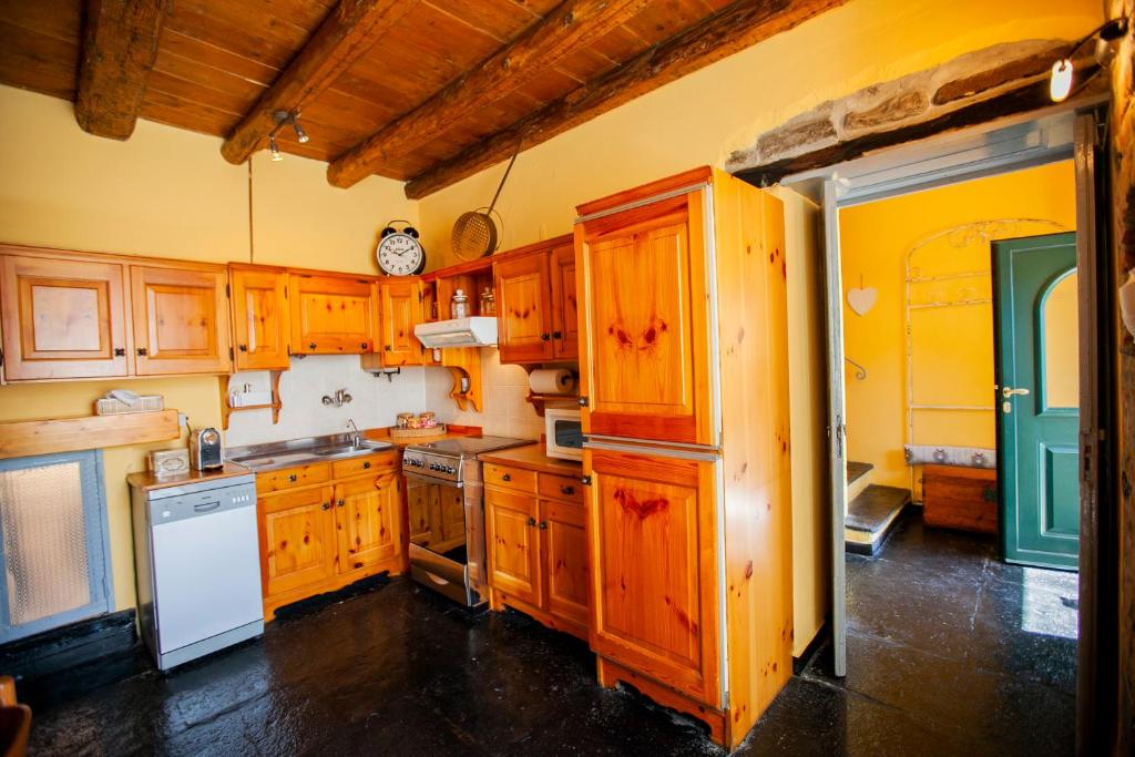 Kuchyň nebo kuchyňský kout v ubytování Casa di MOMO