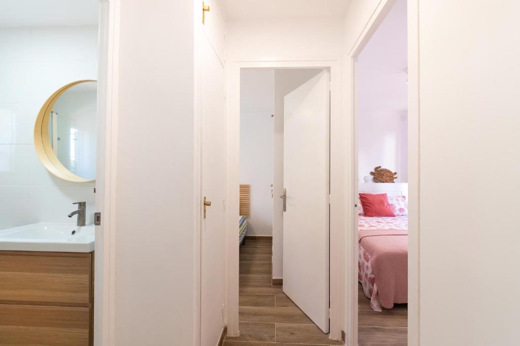 Postel nebo postele na pokoji v ubytování Apartmento RIPOLLES cerca de la Playa