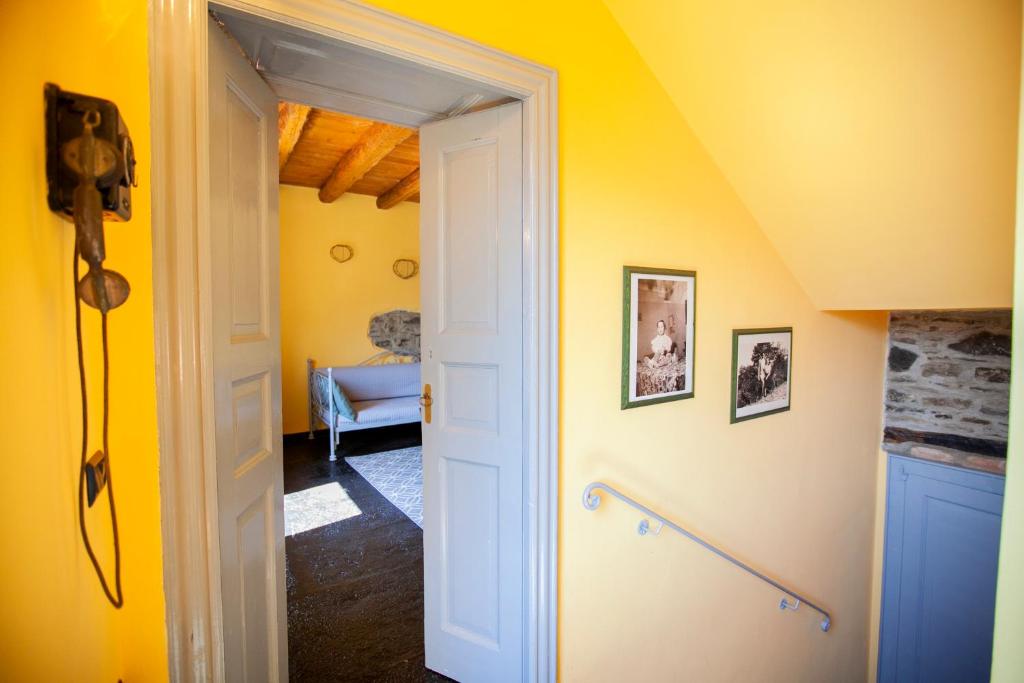 Postel nebo postele na pokoji v ubytování Casa di MOMO