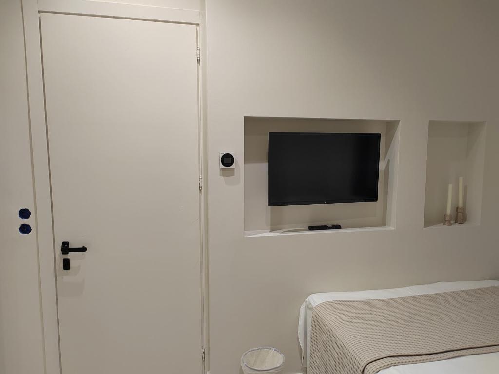 Postel nebo postele na pokoji v ubytování Yasemi