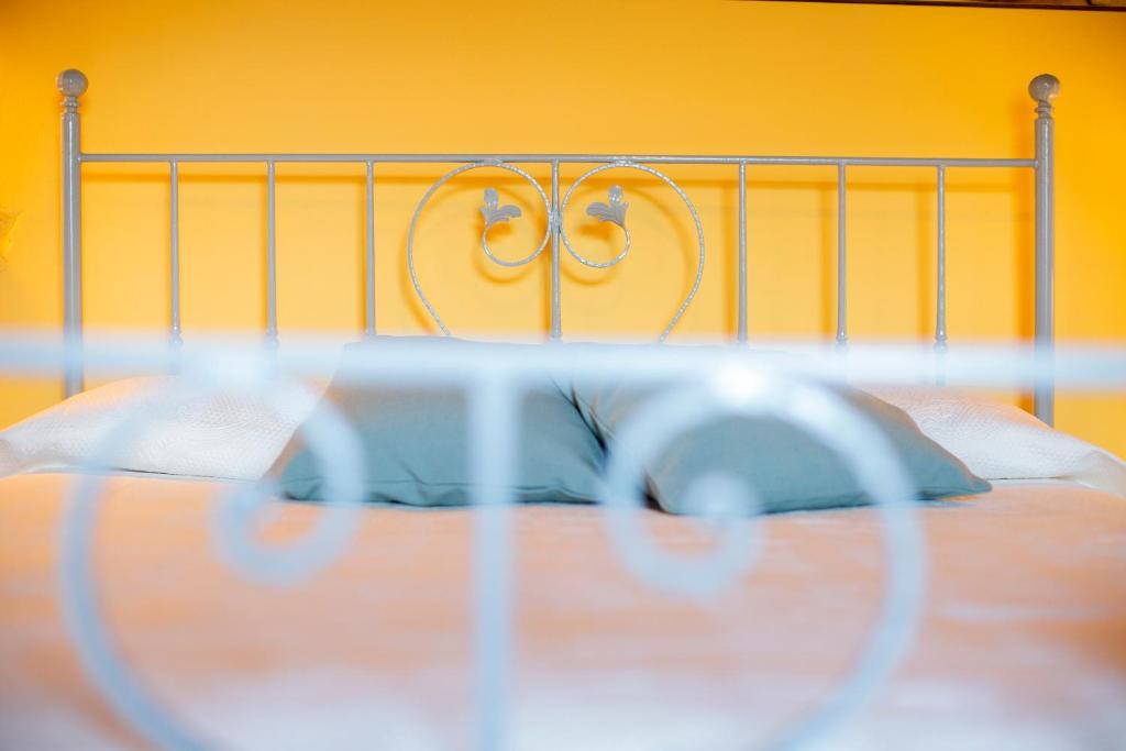Postel nebo postele na pokoji v ubytování Casa di MOMO