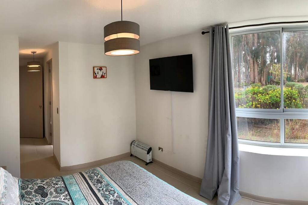 TV a/nebo společenská místnost v ubytování Lugar encantador en condominio en Mirasol