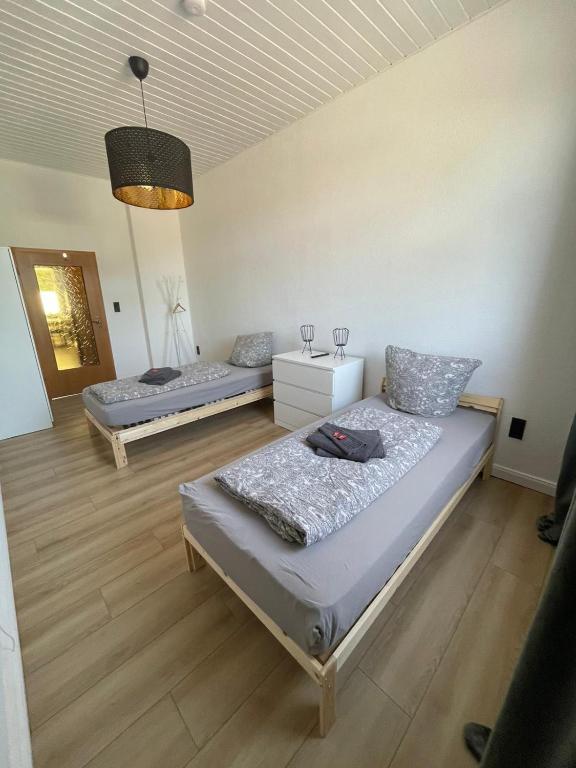 Postel nebo postele na pokoji v ubytování Dat AnkerHuus Emden