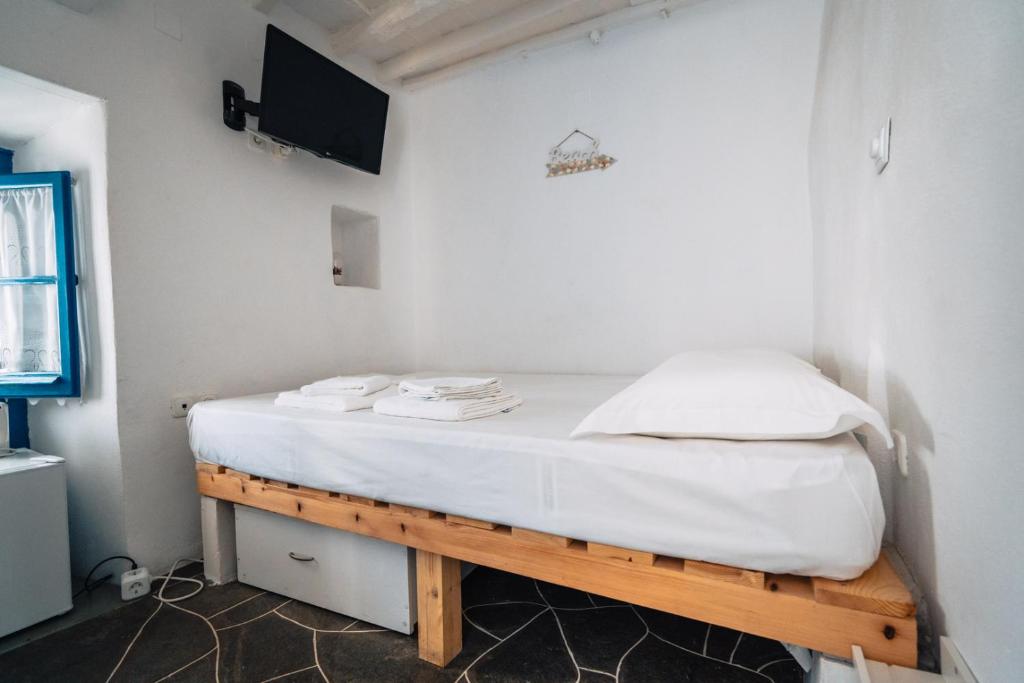 Posteľ alebo postele v izbe v ubytovaní Avra Guestroom