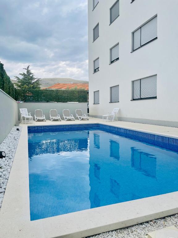 Bazén v ubytovaní Trogir Apartment Nela alebo v jeho blízkosti