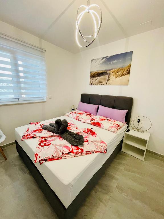 Posteľ alebo postele v izbe v ubytovaní Trogir Apartment Nela