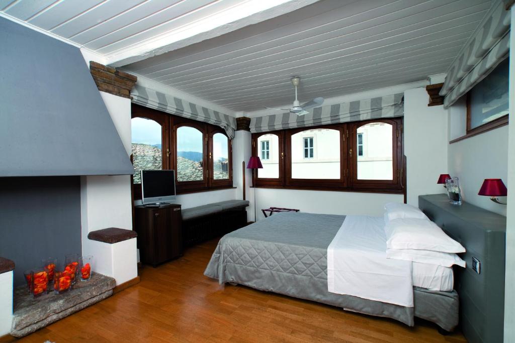 Postel nebo postele na pokoji v ubytování Hotel Charleston
