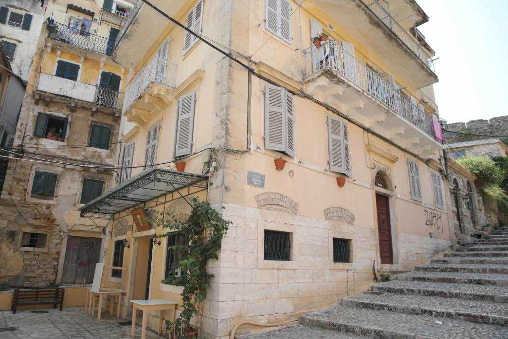 an old building with stairs leading up to it at Casa Domenica in Corfu Town