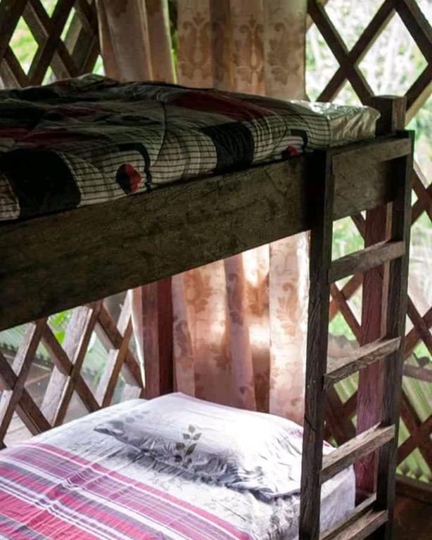 Postel nebo postele na pokoji v ubytování Paraíso Ayahuasca Hotel & Tours