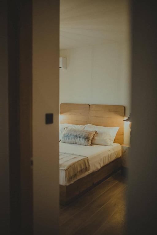Postel nebo postele na pokoji v ubytování Peri Elxis Luxury Suites