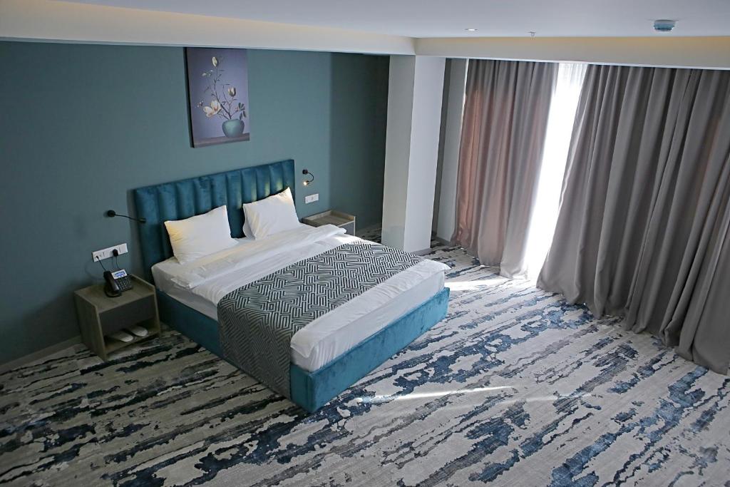 Postel nebo postele na pokoji v ubytování Hotel Address 9D