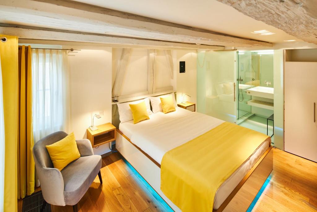 Postel nebo postele na pokoji v ubytování Hotel Max am See