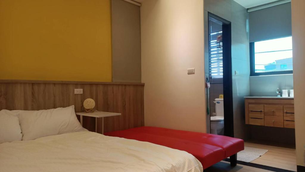 Postel nebo postele na pokoji v ubytování 禾心居He Xin Ju Homestay
