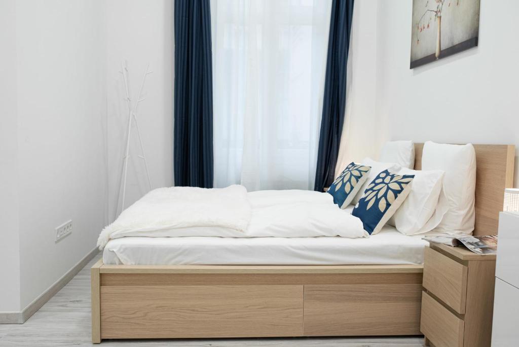 Posteľ alebo postele v izbe v ubytovaní City Center Quiet Flat