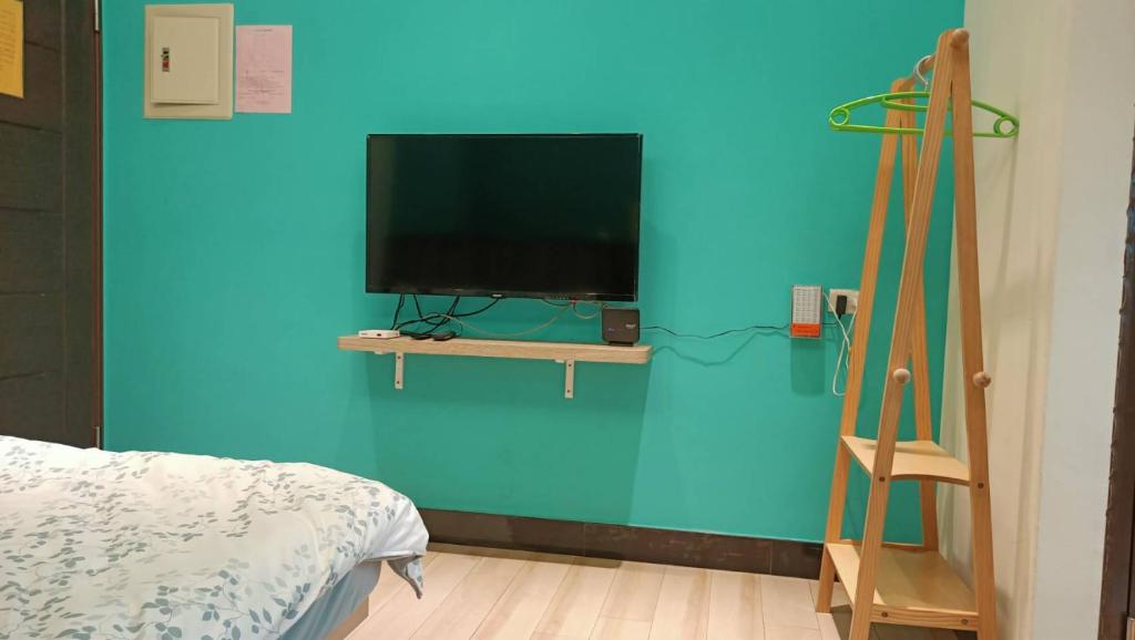 TV a/nebo společenská místnost v ubytování 禾心居He Xin Ju Homestay