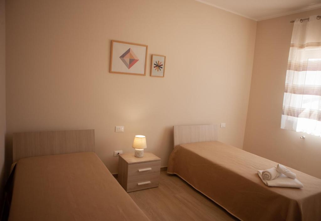 Posteľ alebo postele v izbe v ubytovaní Villa Lombardo Luxury