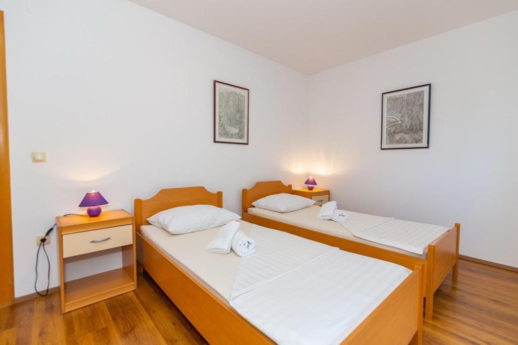 Posteľ alebo postele v izbe v ubytovaní Villa Karina Grubine,Imotski