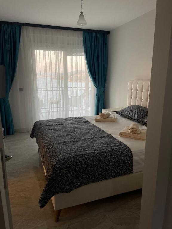 Postel nebo postele na pokoji v ubytování Beach front apartment