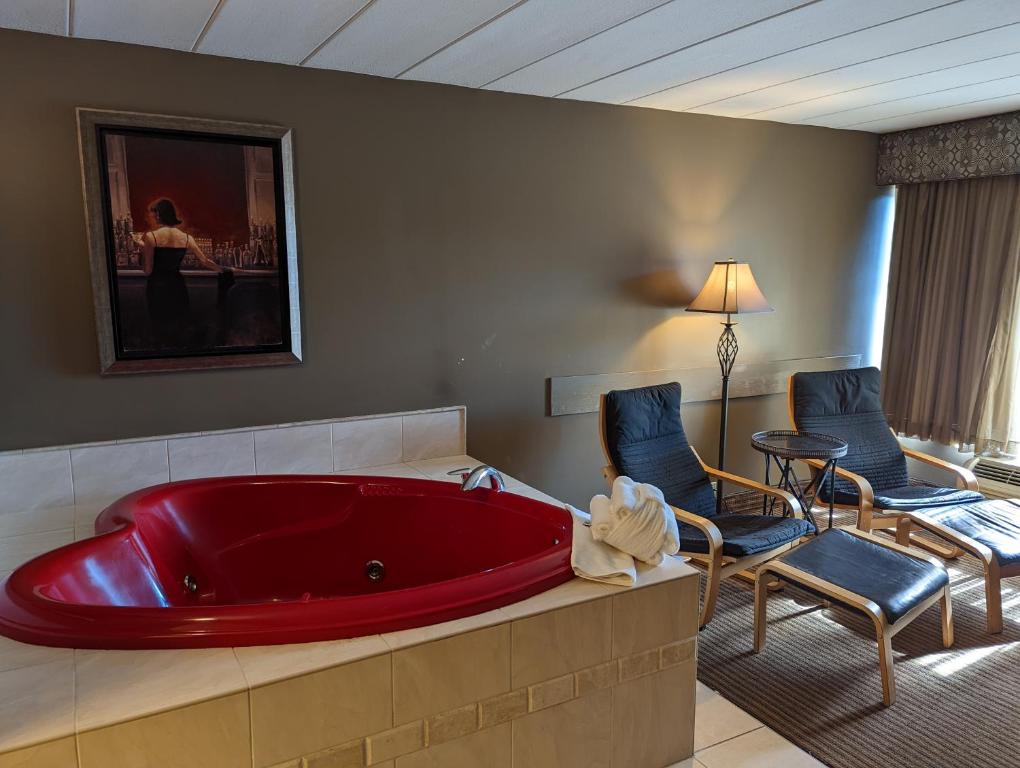 Posezení v ubytování Days Inn by Wyndham Birch Run