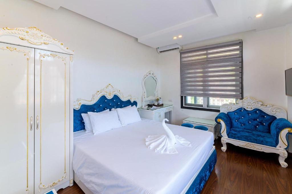 Giường trong phòng chung tại Nostalgia Hotel and Spa