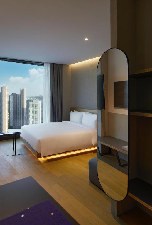 Postel nebo postele na pokoji v ubytování Take Hotel Seoul Gwangmyeong