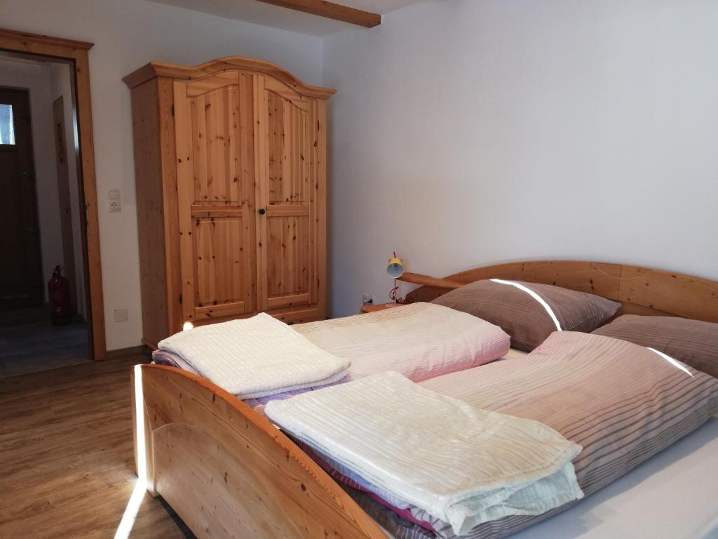 Postel nebo postele na pokoji v ubytování Erlhofer Apartments