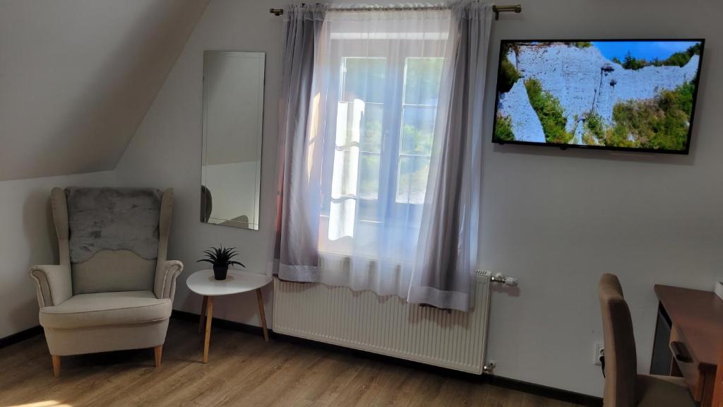 Televízia a/alebo spoločenská miestnosť v ubytovaní B&B Plitvice Lakes Villa Prica