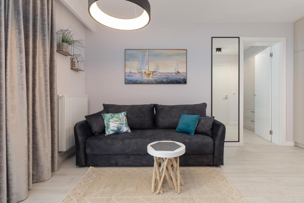 Posezení v ubytování Mielno Sea & Lake Apartment by Noclegi Renters