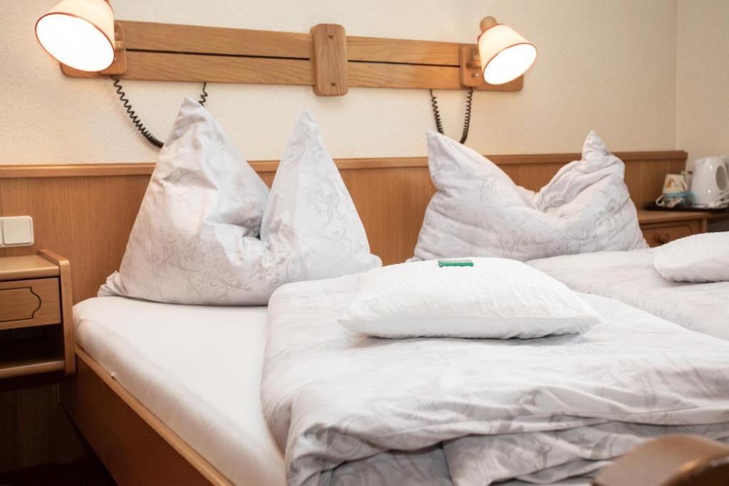 Postel nebo postele na pokoji v ubytování Rosspointnerhof