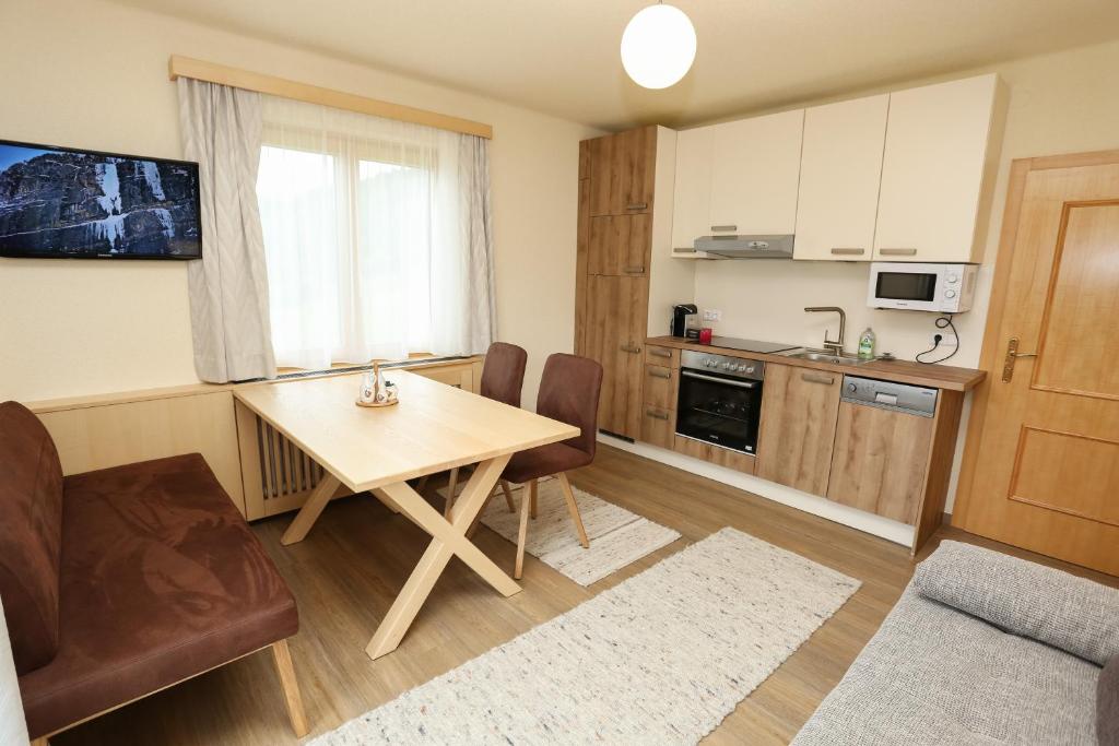 Kuchyň nebo kuchyňský kout v ubytování Rosspointnerhof