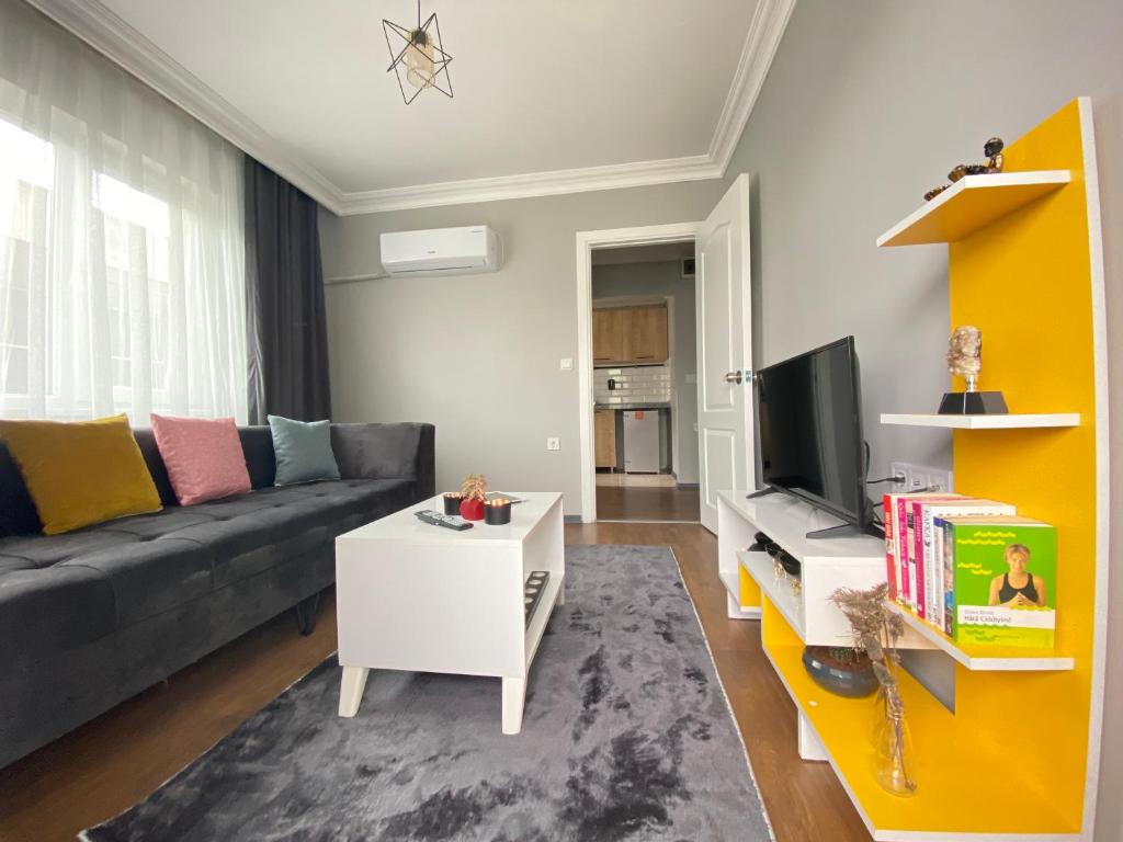 TV a/nebo společenská místnost v ubytování ANA GÜNEY Apart Otel