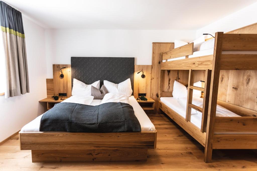 Posteľ alebo postele v izbe v ubytovaní Bergseegut Chalet und Apartment