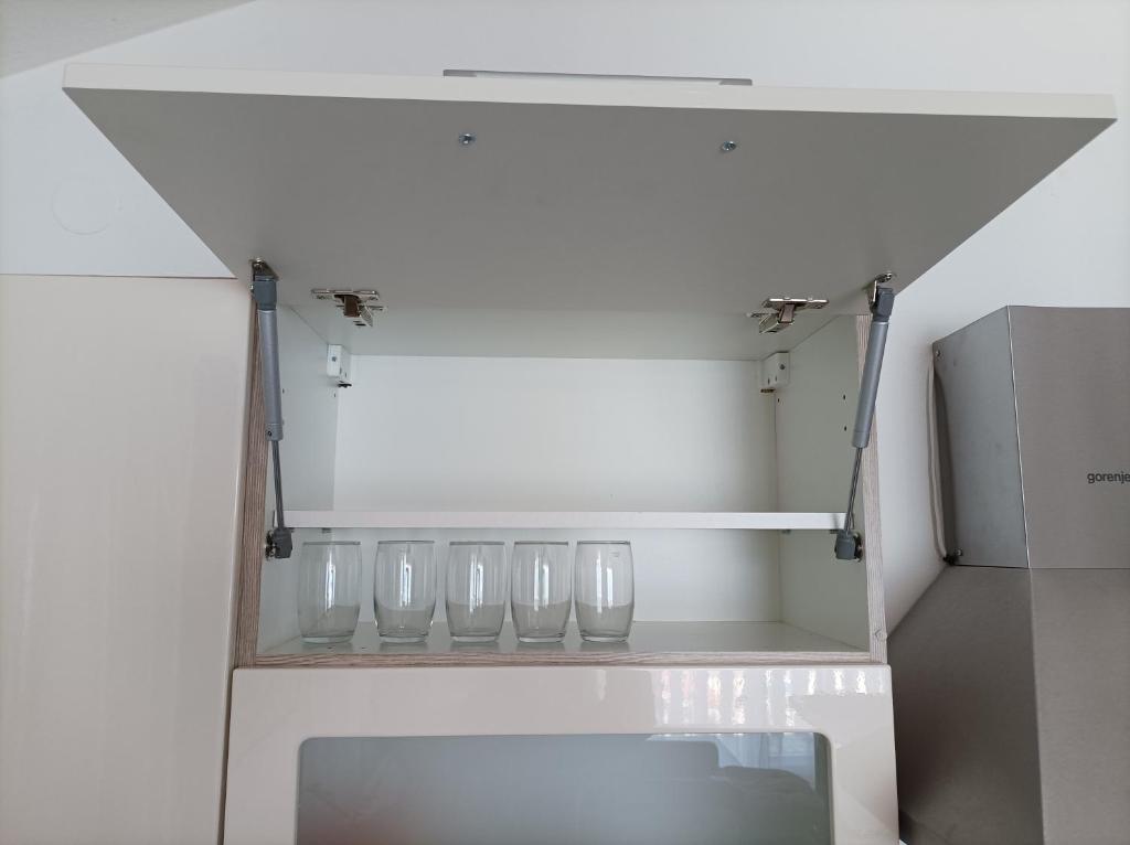 Kuchyňa alebo kuchynka v ubytovaní Apartman Periska
