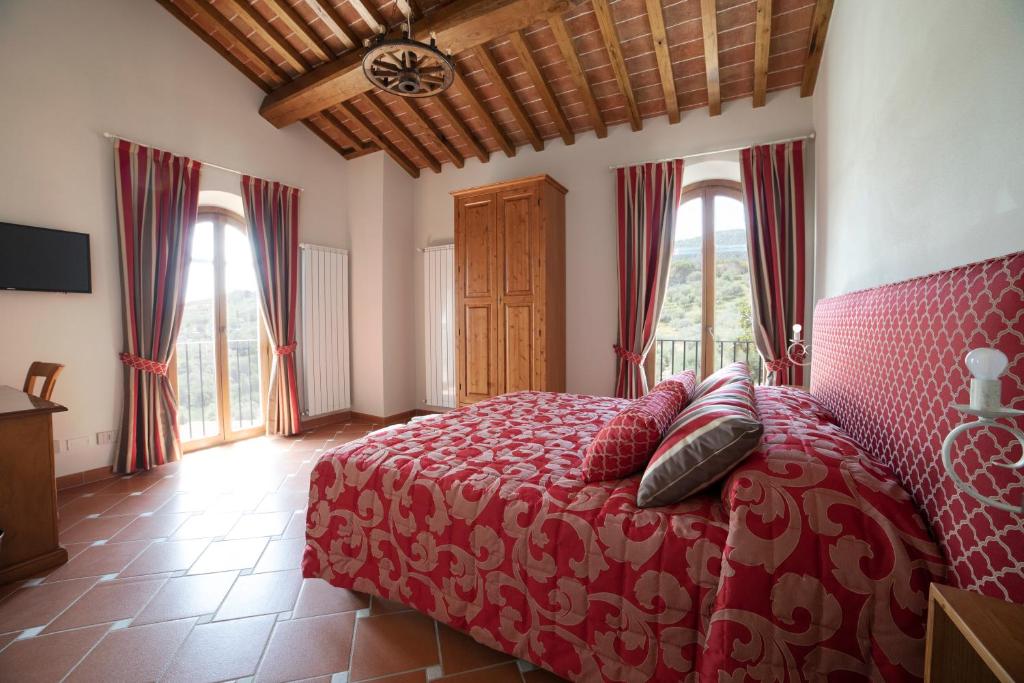 Postel nebo postele na pokoji v ubytování Agriturismo Il Dolce Vivere