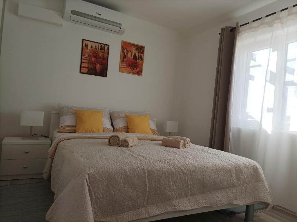 Posteľ alebo postele v izbe v ubytovaní Apartman Periska