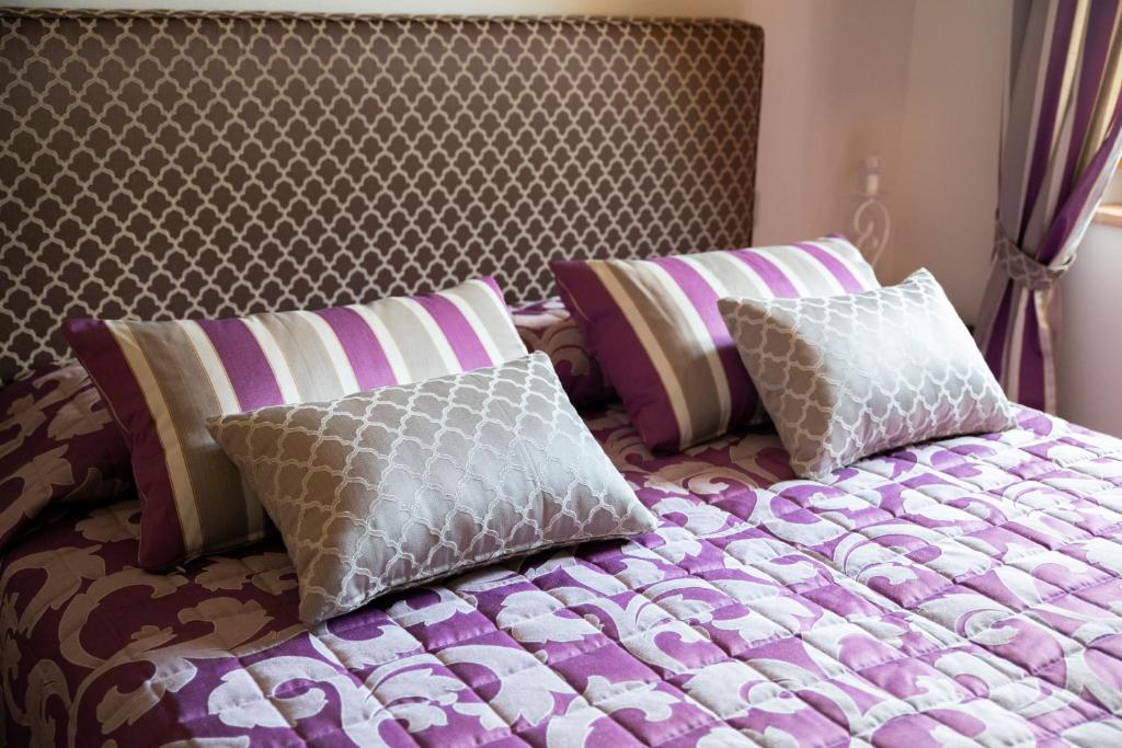 Postel nebo postele na pokoji v ubytování Agriturismo Il Dolce Vivere