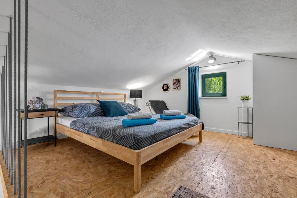 Postel nebo postele na pokoji v ubytování Olive Garden