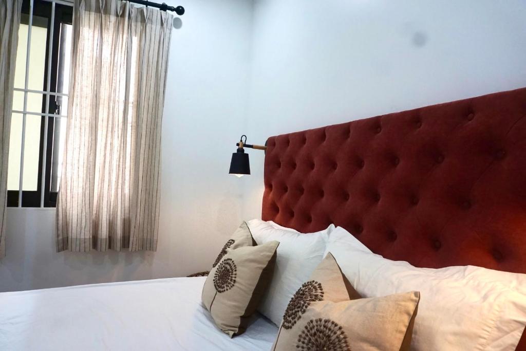 Postel nebo postele na pokoji v ubytování Papilio Homestay Tay Ho