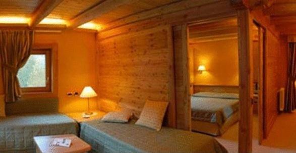 Postel nebo postele na pokoji v ubytování Eco Wellness Hotel Notre Maison