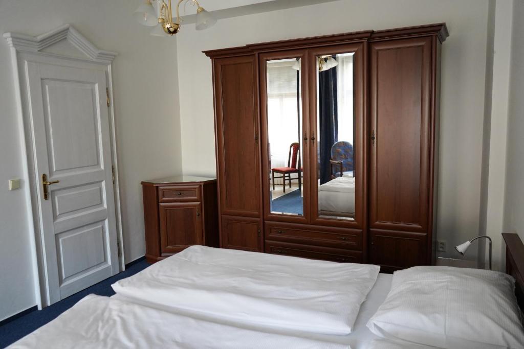 Postel nebo postele na pokoji v ubytování EA Apartmány Mozart