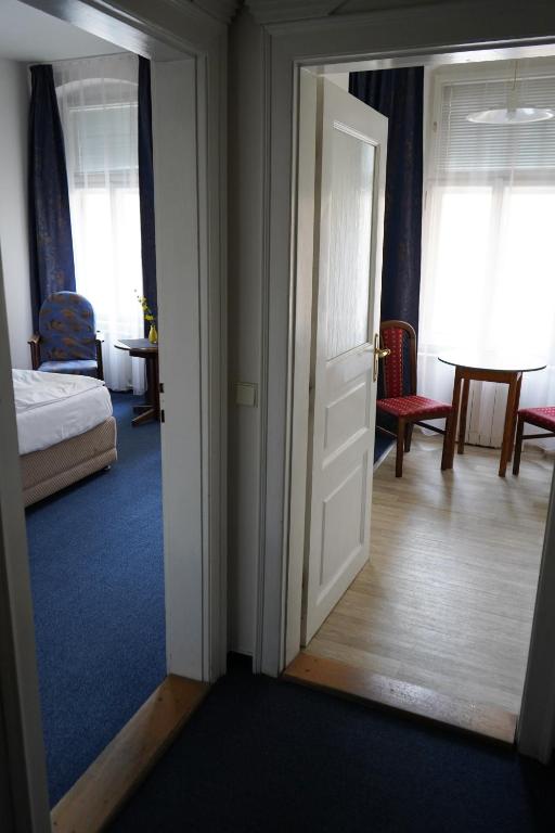 Postel nebo postele na pokoji v ubytování EA Apartmány Mozart