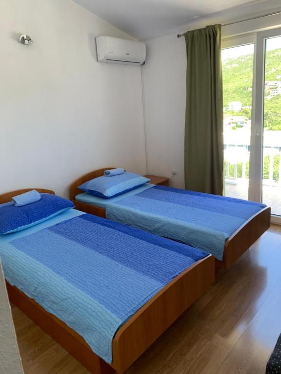 Postel nebo postele na pokoji v ubytování Room Ivana