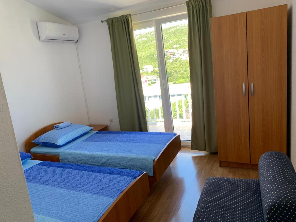 Postel nebo postele na pokoji v ubytování Room Ivana