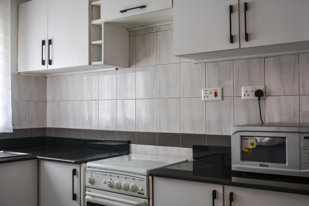 Kuchyň nebo kuchyňský kout v ubytování Brickwood Apartments