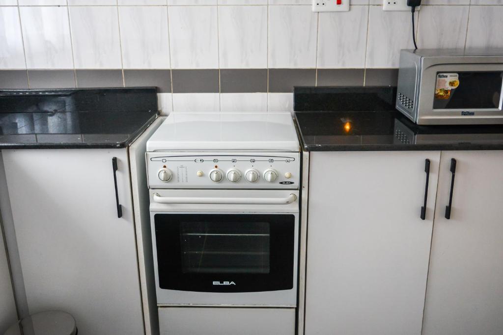 Kuchyň nebo kuchyňský kout v ubytování Brickwood Apartments
