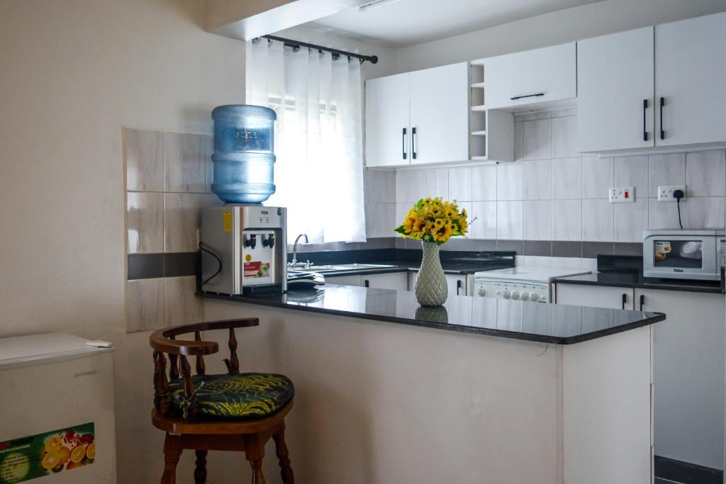 Kuchyň nebo kuchyňský kout v ubytování Brickwood Apartments