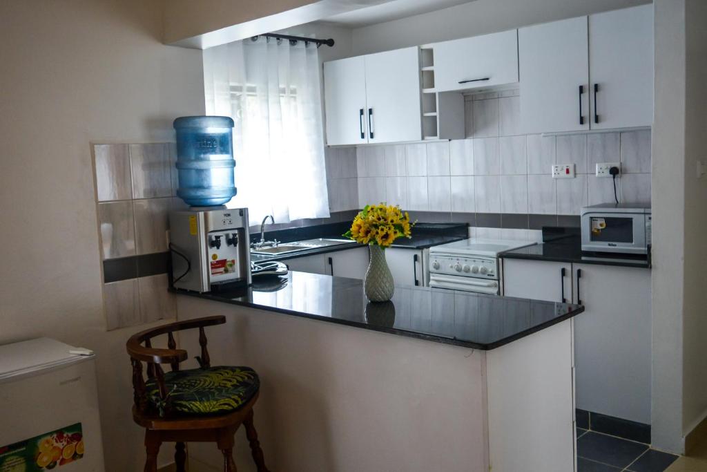 Kuchyň nebo kuchyňský kout v ubytování Brickwood Apartments