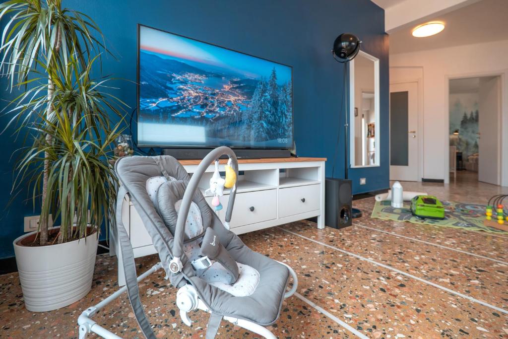 Televízia a/alebo spoločenská miestnosť v ubytovaní Babyaccomodation Family Heaven