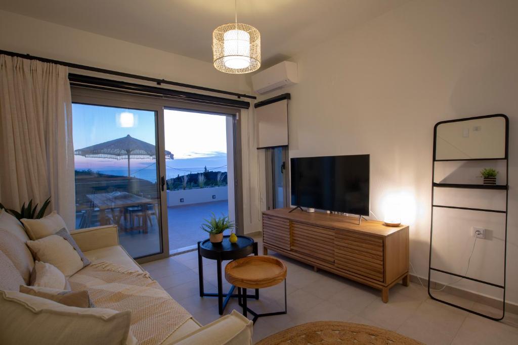Telewizja i/lub zestaw kina domowego w obiekcie HYADES VILLAS LEFKADA