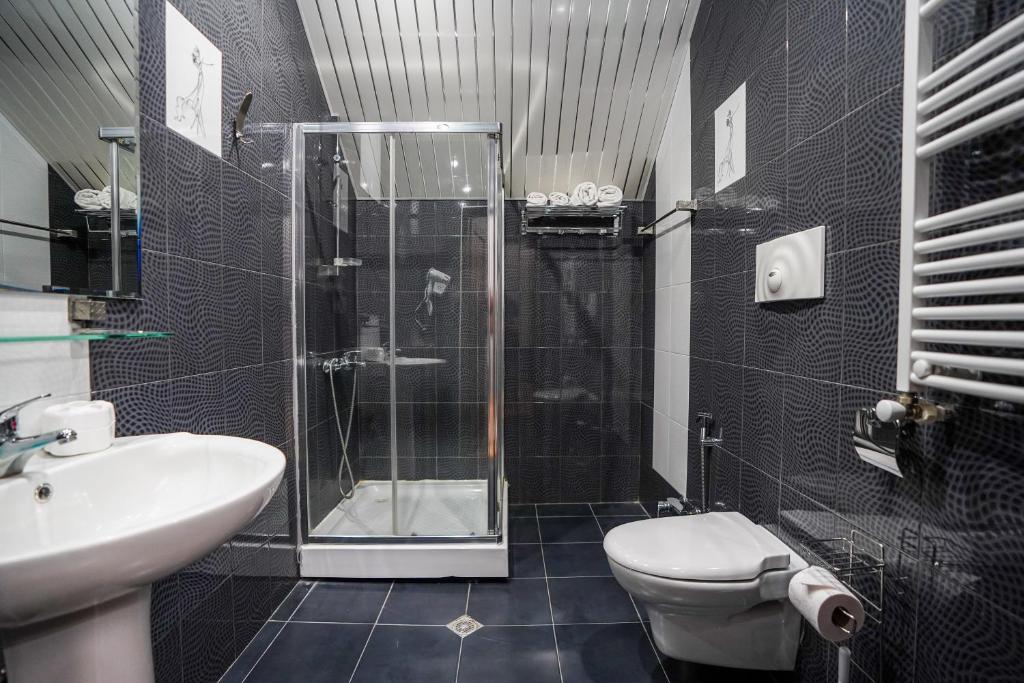 Koupelna v ubytování Natali Hotel